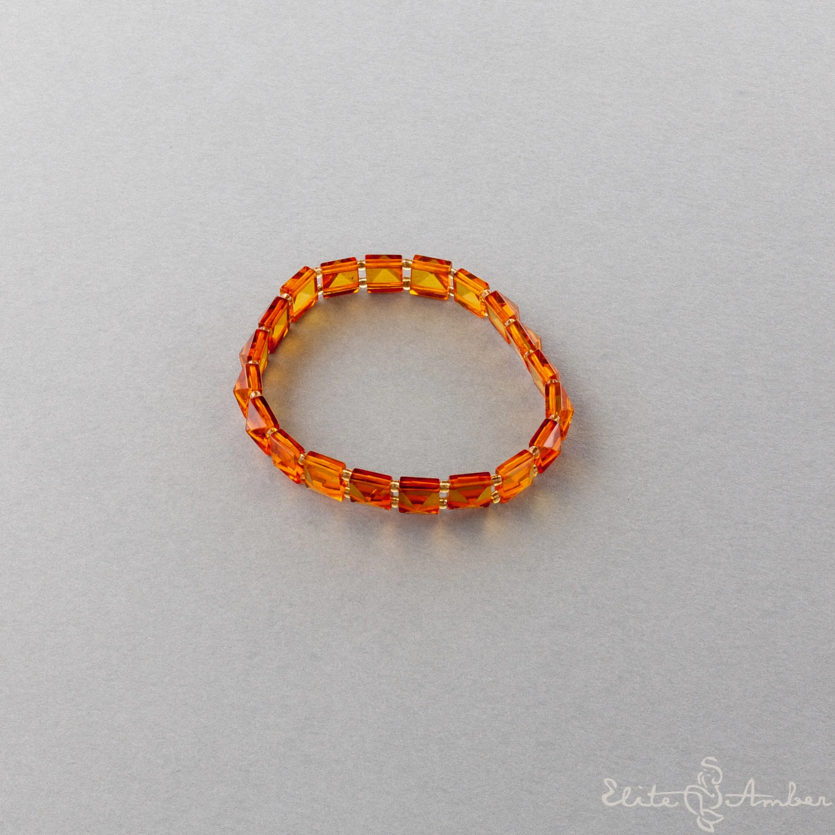 Amber bracelet "Honey pyramid"