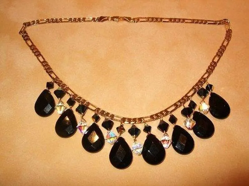 Black Onyx and 18 K rolled Gold Necklace