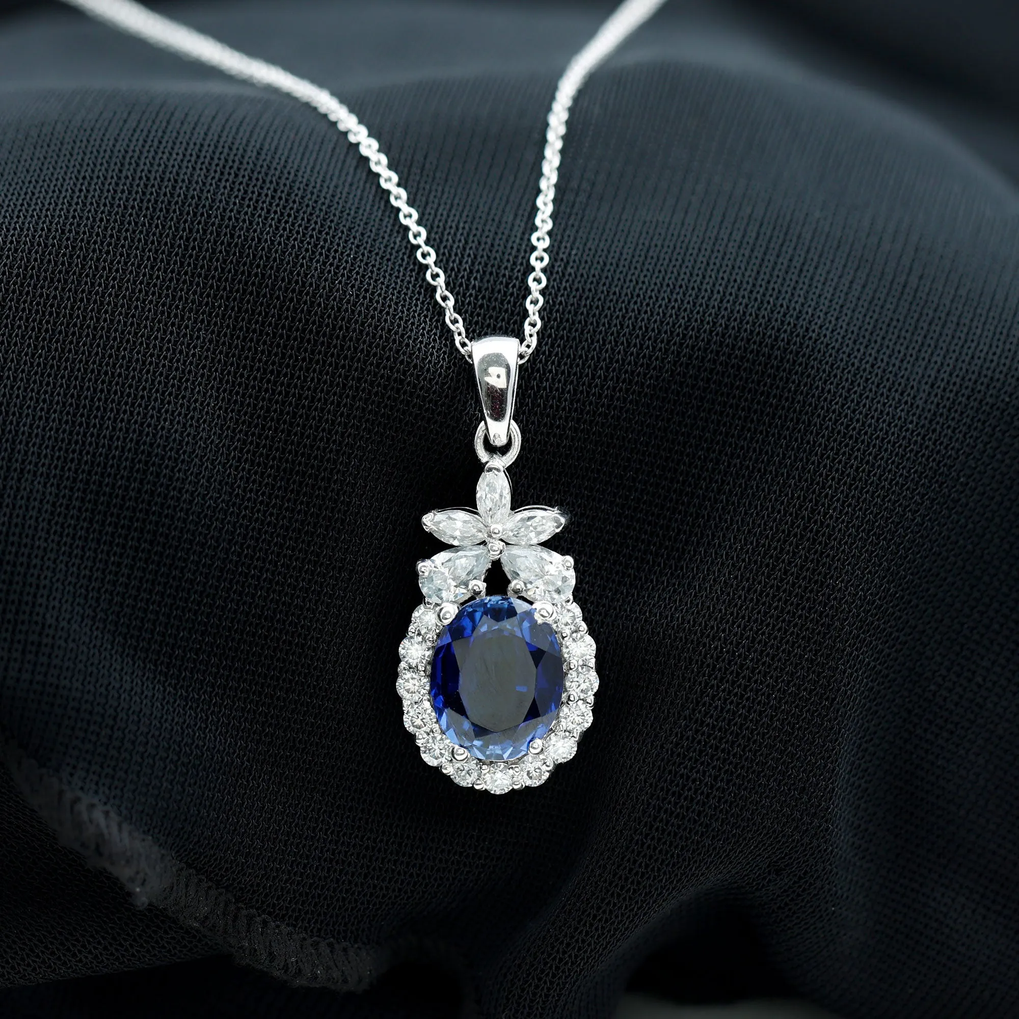 Oval Cut Created Blue Sapphire and Moissanite Floral Statement Pendant