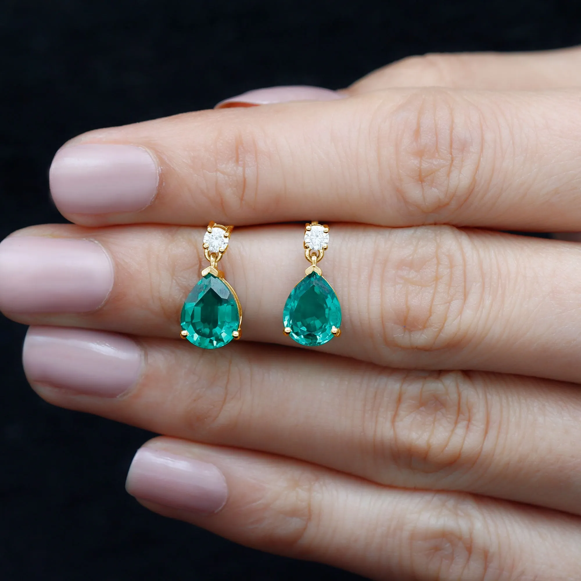 Pear Cut Created Emerald Teardrop Earrings with Moissanite