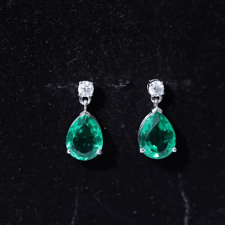 Pear Cut Created Emerald Teardrop Earrings with Moissanite