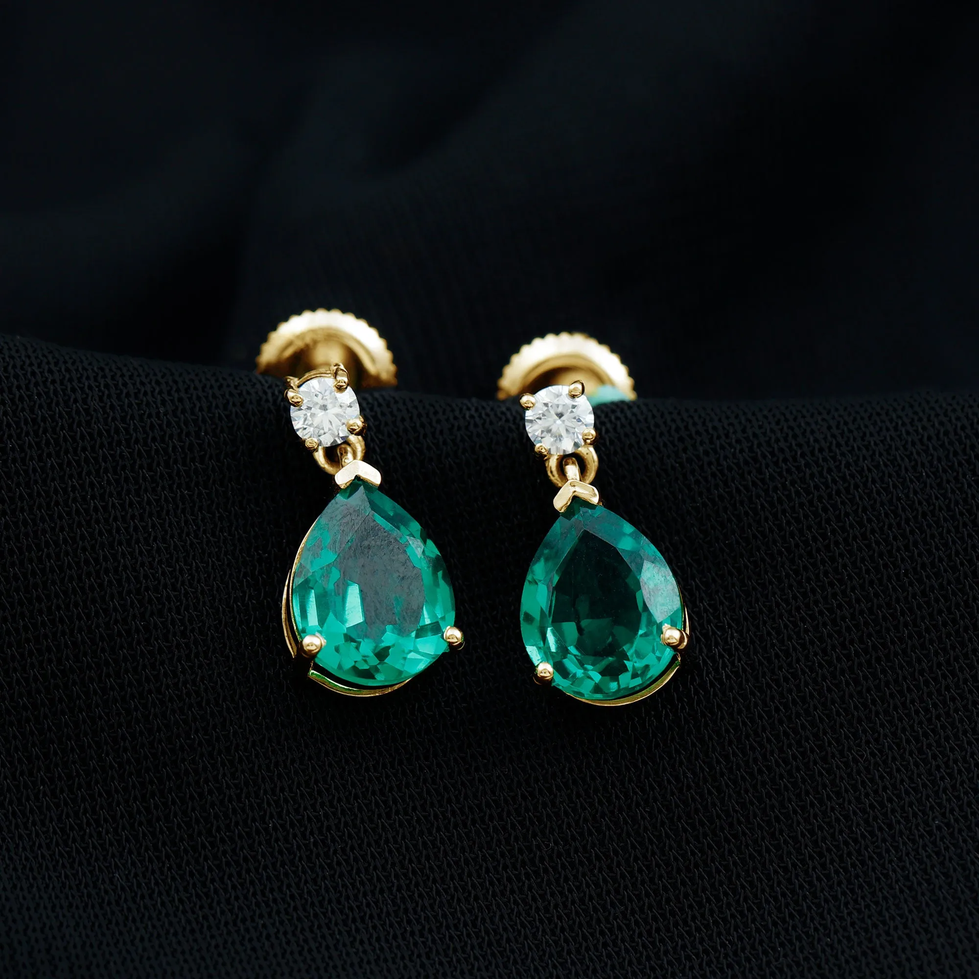 Pear Cut Created Emerald Teardrop Earrings with Moissanite