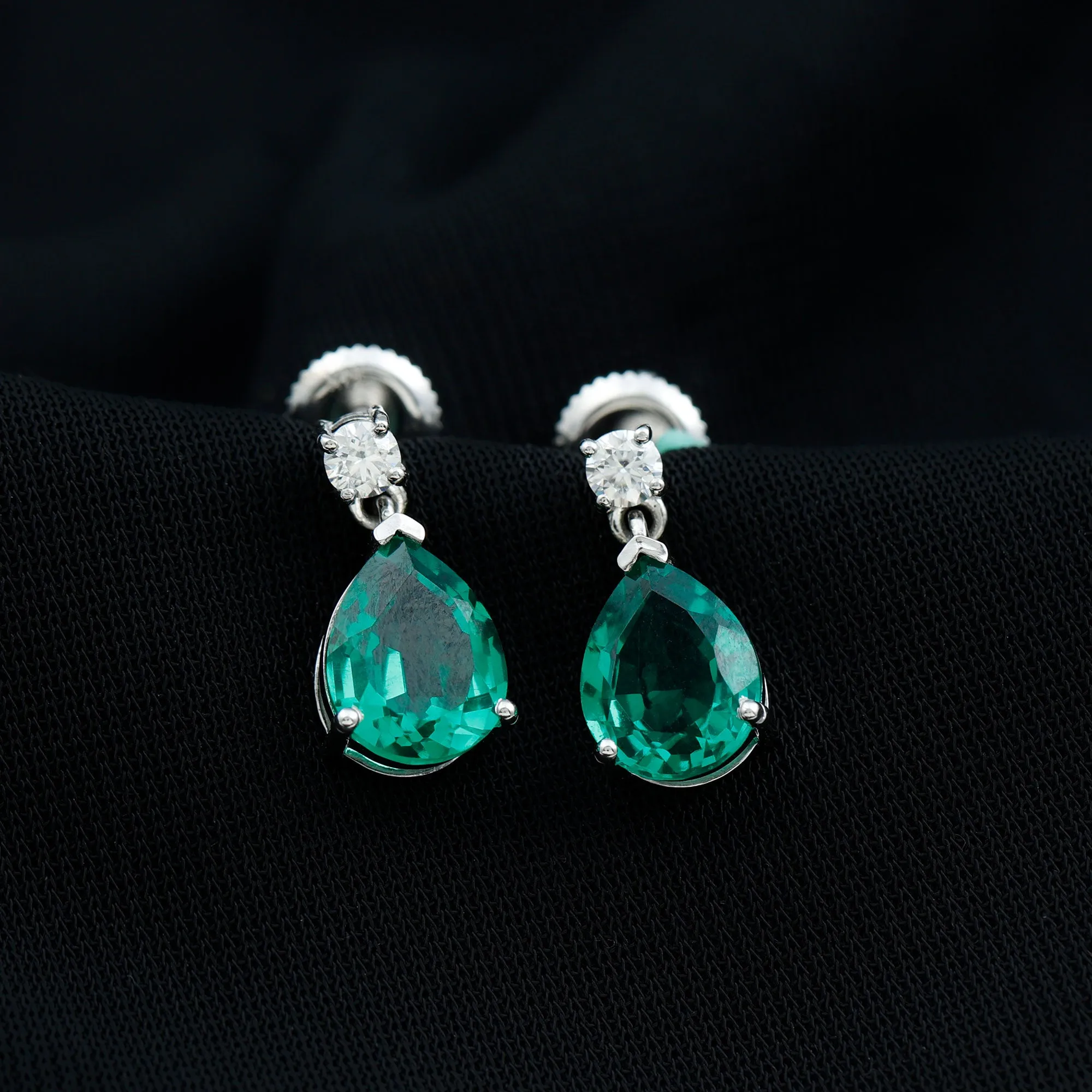 Pear Cut Created Emerald Teardrop Earrings with Moissanite